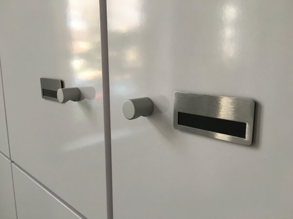 Lockers with aluminium knobs and name tabs